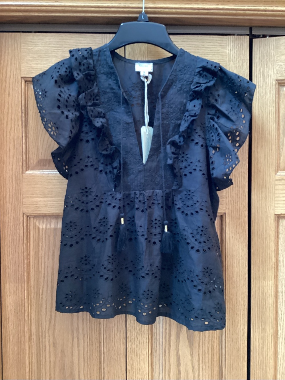 ARTELIER Nicole Miller black eyelet shirt with tassels. Women’s size medium NWT